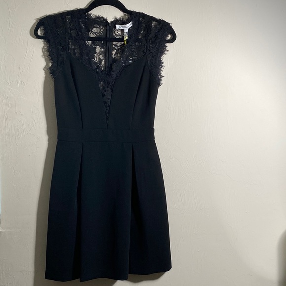 BCBGeneration Dresses & Skirts - BCBGeneration Lace Trim Mini Dress in Black. Size 2